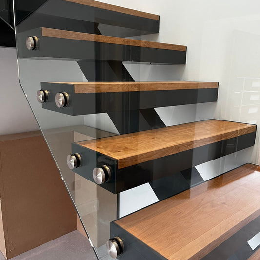 Central Spine Staircase with Frameless Glass Balustrade - West Bergholt, Essex - Design Fabrications