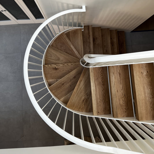 Feature Helical Staircase with Metal Spindle Balustrade and Bespoke Oak Treads - Design Fabrications