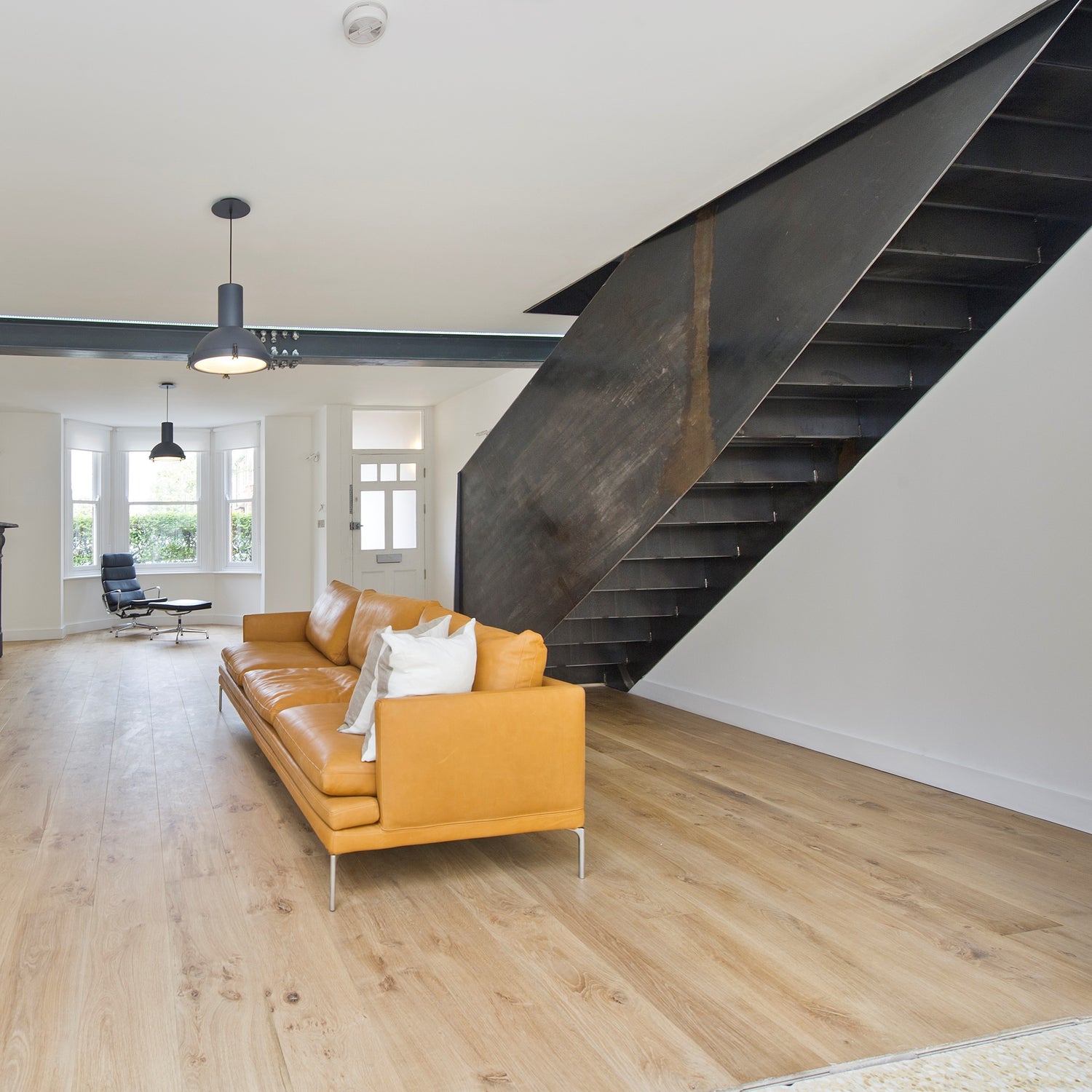 Raw Steel Plate feature staircase. Looking for a bold and rustic design for your feature staircase? Our single plate staircase could be the design you wish to achieve.